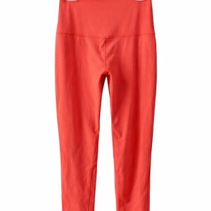 Lululemon high-rise leggings in a vibrant coral shade.